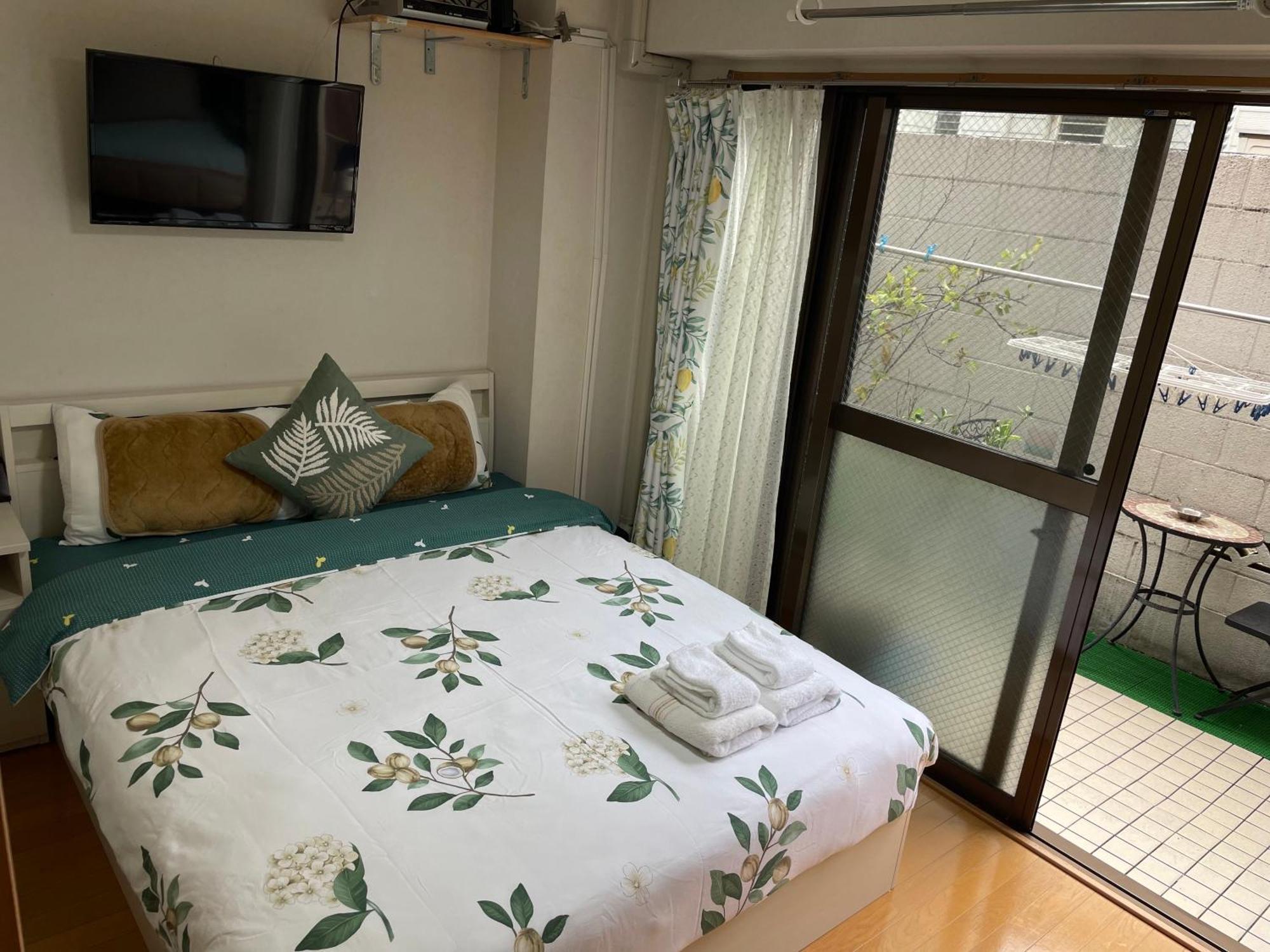 新宿庭院の屋-Shinjuku Garden Home -28 Square Meters King Size Bed Garden Room Tokio Buitenkant foto